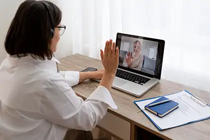 Doctor providing a telepsychiatry consultation to a patient
