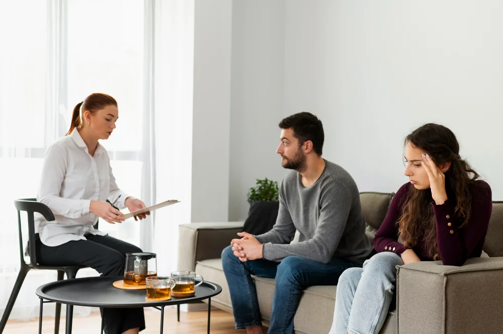 Couple in psychiatric therapy session in Ann Arbor, MI